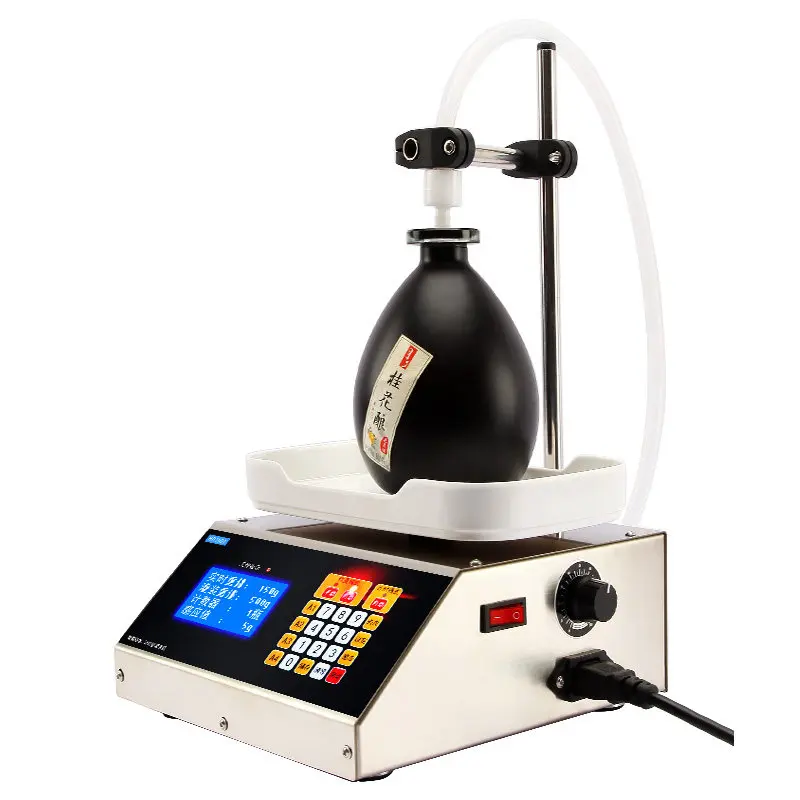 

Liquid filling machine Small automatic Baijiu soybean milk edible oil numerical control weighing quantitative packaging