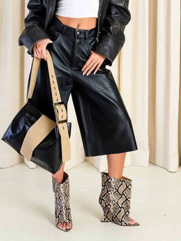 الربيع والصيف جديد فم السمكة المنحدر عالية الكعب المرأة المفتوحة مسننة أحذية قصيرة، أحذية باردة الموضة وأشار المألوف