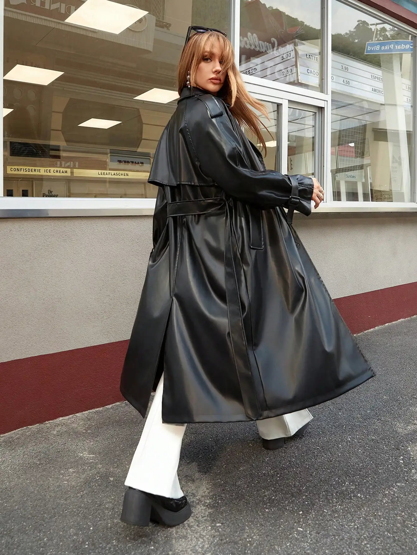 A stylish spice girl long PU trench coat