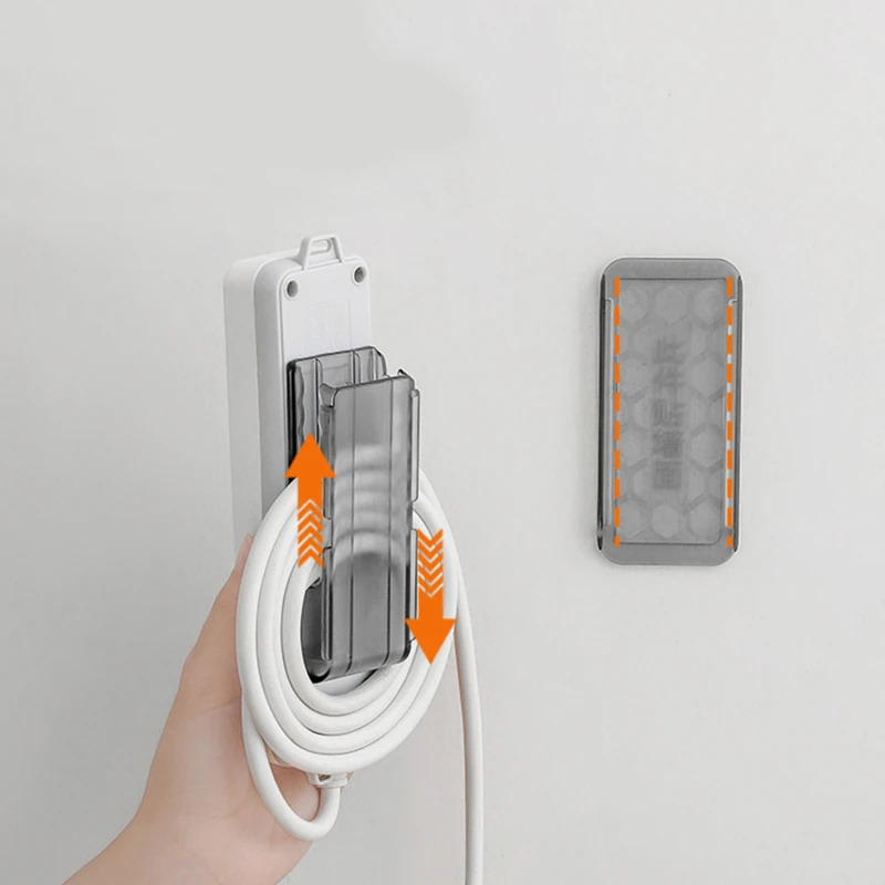 Wall-Mounted Fixed Plug Holder Punch-free Plug Rack Extension Socket Fixer Cable Wire Organizer Power Strip Holder Storage Rack