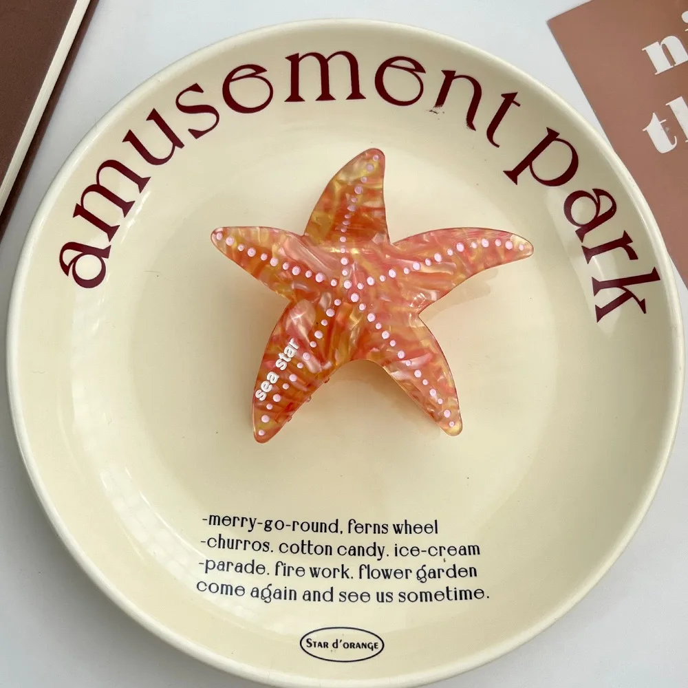 مخلب نجم البحر: نمط ترفيهي بحري وفريد من نوعه، مصنوع يدويًا من مادة الأسيتات عالية الجودة، وتجسيد الموضة والتري