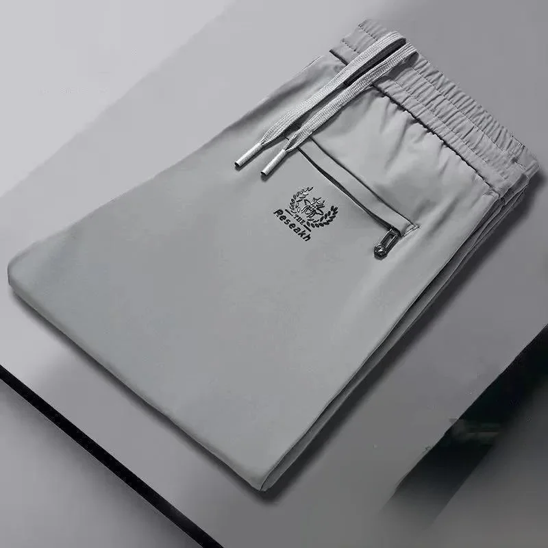 

Летние мужские повседневные брюки из ледяного шелка, эластичные, тонкие, прямого кроя, свободные, больших размеров, удобные, модные, городские, длинные брюки