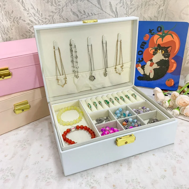 

Wooden jewelry storage box with lock, pearl earrings, necklace, bracelet, and exquisite jewelry display box
