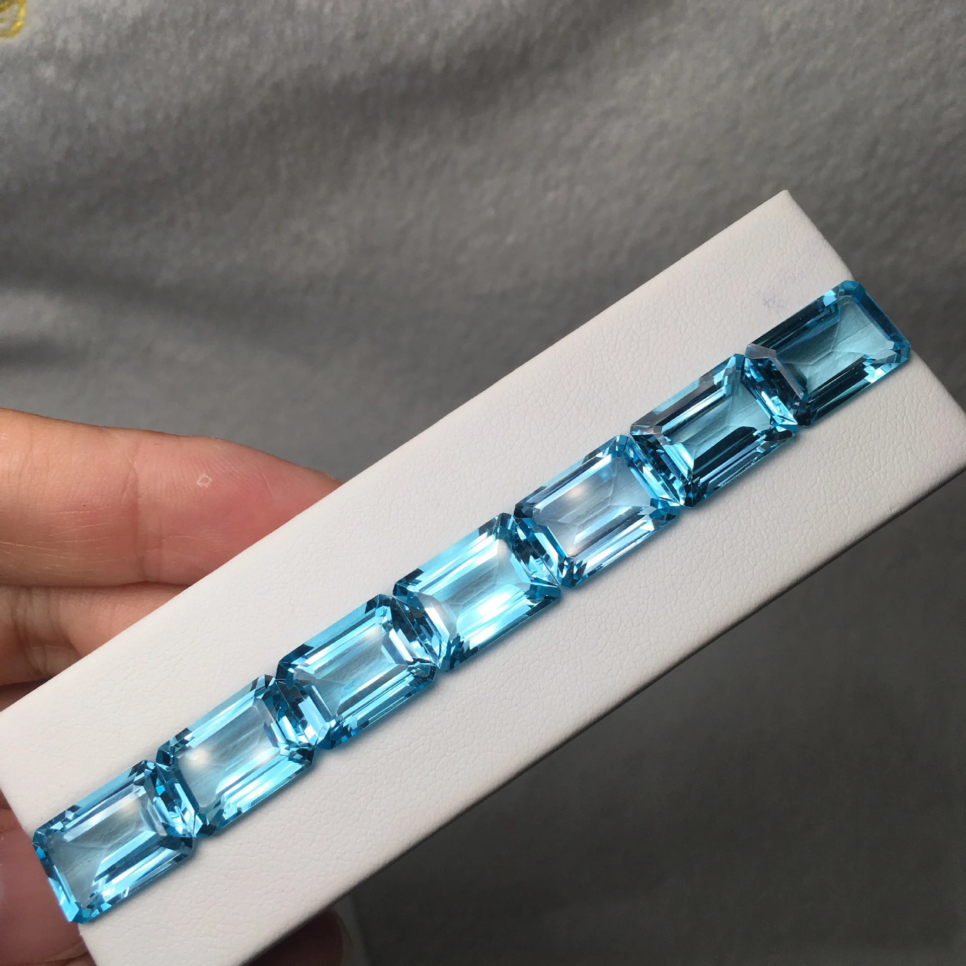 wholesale-natural-sky-blue-topaz-emerald-cut-octagon-aaa-quality-vvs-loose-gemstone-available-in-3x5-8x10mm-for-jewelry