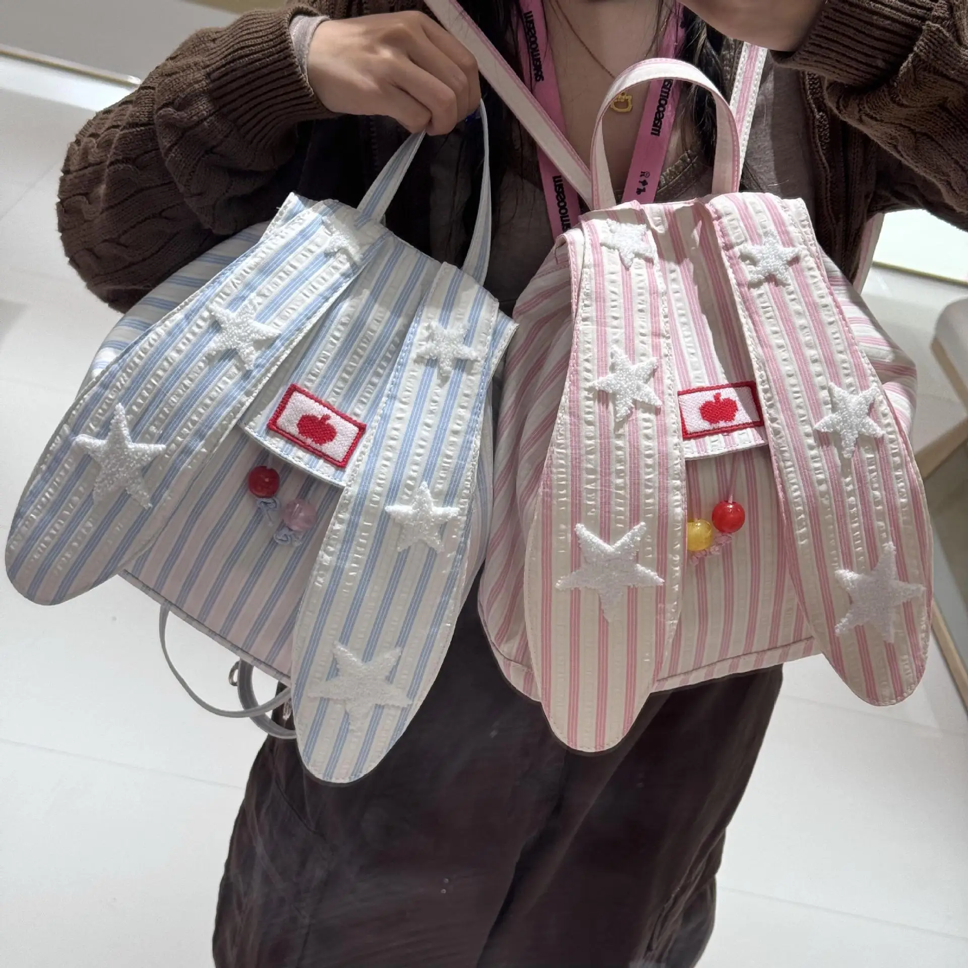 1 small fresh striped star backpack Large capacity girls travel cute schoolbag