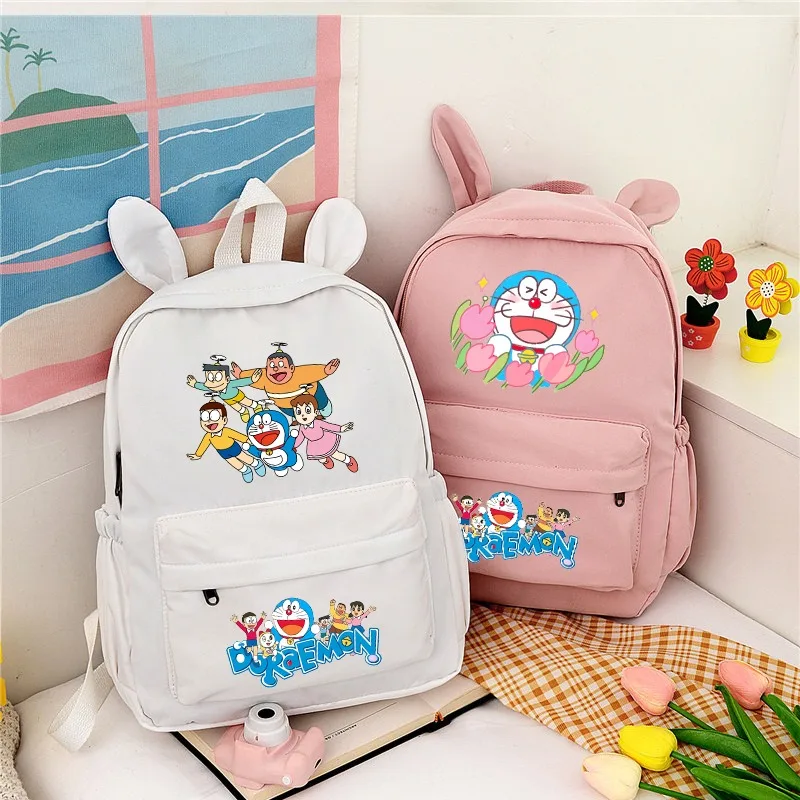

Doraemons Cute Backpack Large Capacity Portable Schoolbag Cartoon Anime Pattern Printed Backpacks Back To School Party Gifts New