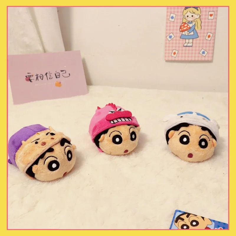 Hot selling spot doll machine Crayon Shin chan plush pendant transforms into salted egg superhero bag pendant, children's gift