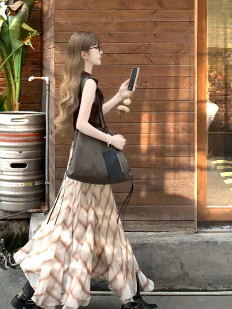 패셔너블한 레트로 디자인 매듭 끈 민소매 조끼 여성용 여름 2025 캐주얼 다용도 탑 우아한 드레이프 트위스트 매듭 스타일