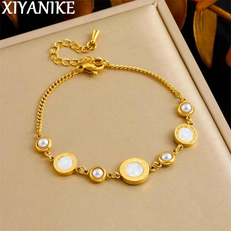 XIYANIKE 316L 스테인레스 스틸 쉘 상감 로마 숫자 디스크 디자인 팔찌 여성을위한 절묘한 손목 체인 쥬얼리 선물