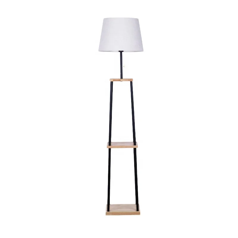 

Hotel Nordic stands in the light-colored modern LED wooden floor lamp with table in the living room