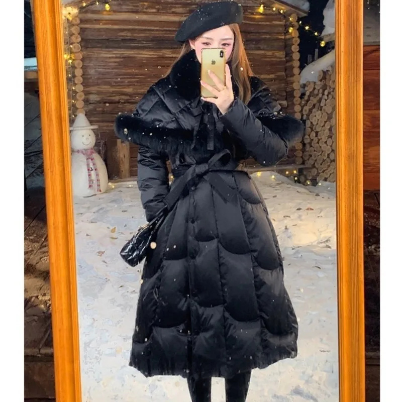 El nuevo cuello de piel de copia desmontable de alta gama con longitud media hasta la rodilla que cincha la cintura te hace parecer más delgado en abrigo de invierno