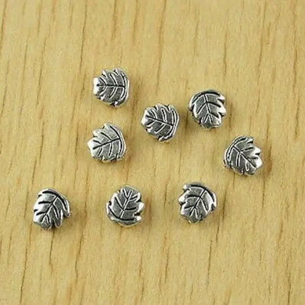 

50pcs 7.0x6.9mm hole is 1.1mm Tibetan silver facet leaf spacer beads H2510