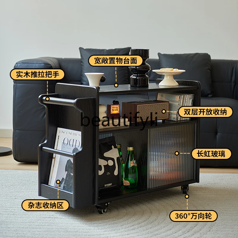 حافة من الخشب الصلب، عدد قليل من طاولات القهوة الصغيرة، رف خزانة عربة سوداء قابلة للإزالة