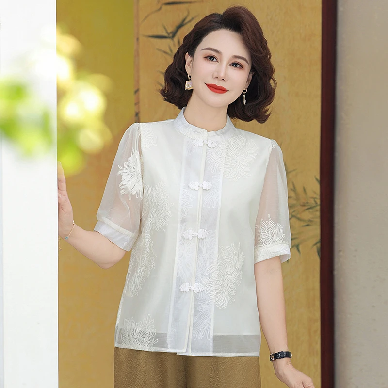 

Новый китайский летний комплект в национальном стиле для мам: топ с вышивкой снежинок и коротким рукавом для женщин среднего возраста, летний, из двух предметов.