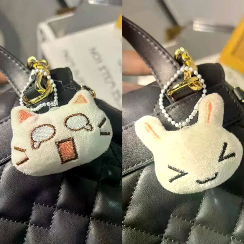 Simpatico cartone animato timido coniglio portachiavi in peluche Kawaii divertente piccolo coniglio peluche zaino ciondolo decorazione accessori regalo