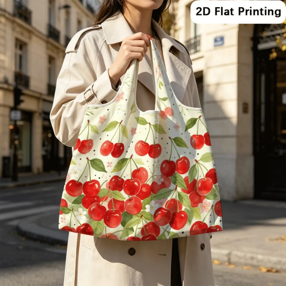 Cherries glow amid tiny blossoms Compact foldable tote bag, shoulder style for quick trips.