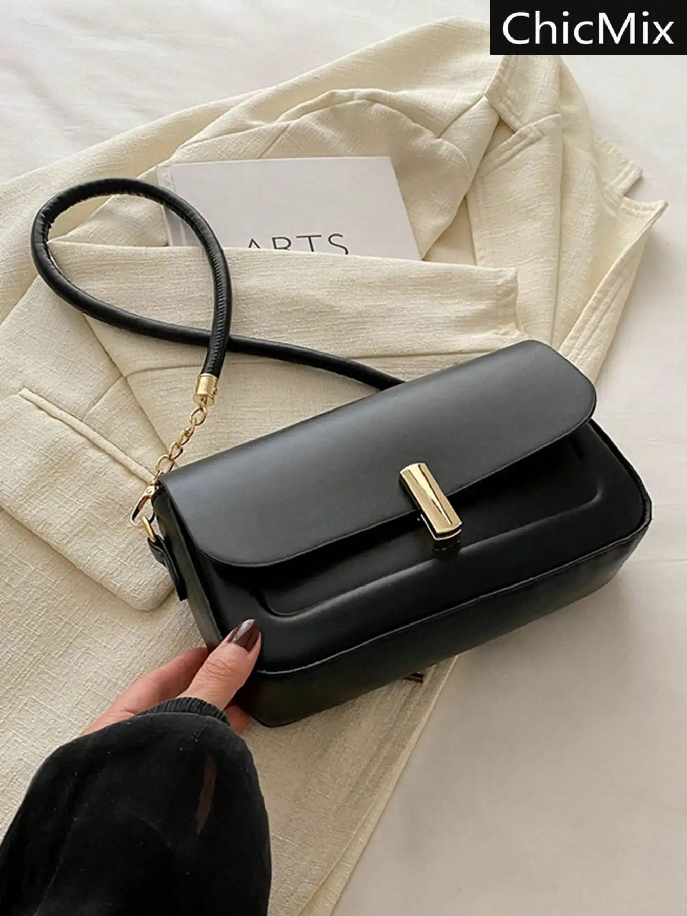 

Black Minimalist Flap Shoulder Bag with Gold Clasp and Chain Strap