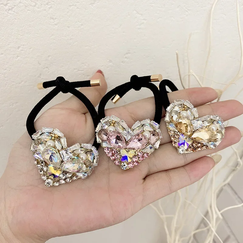 Moda strass cuore elastico fasce per capelli archi donne ragazze gioielli di lusso corda per capelli cravatta accessori per capelli squisiti coreani