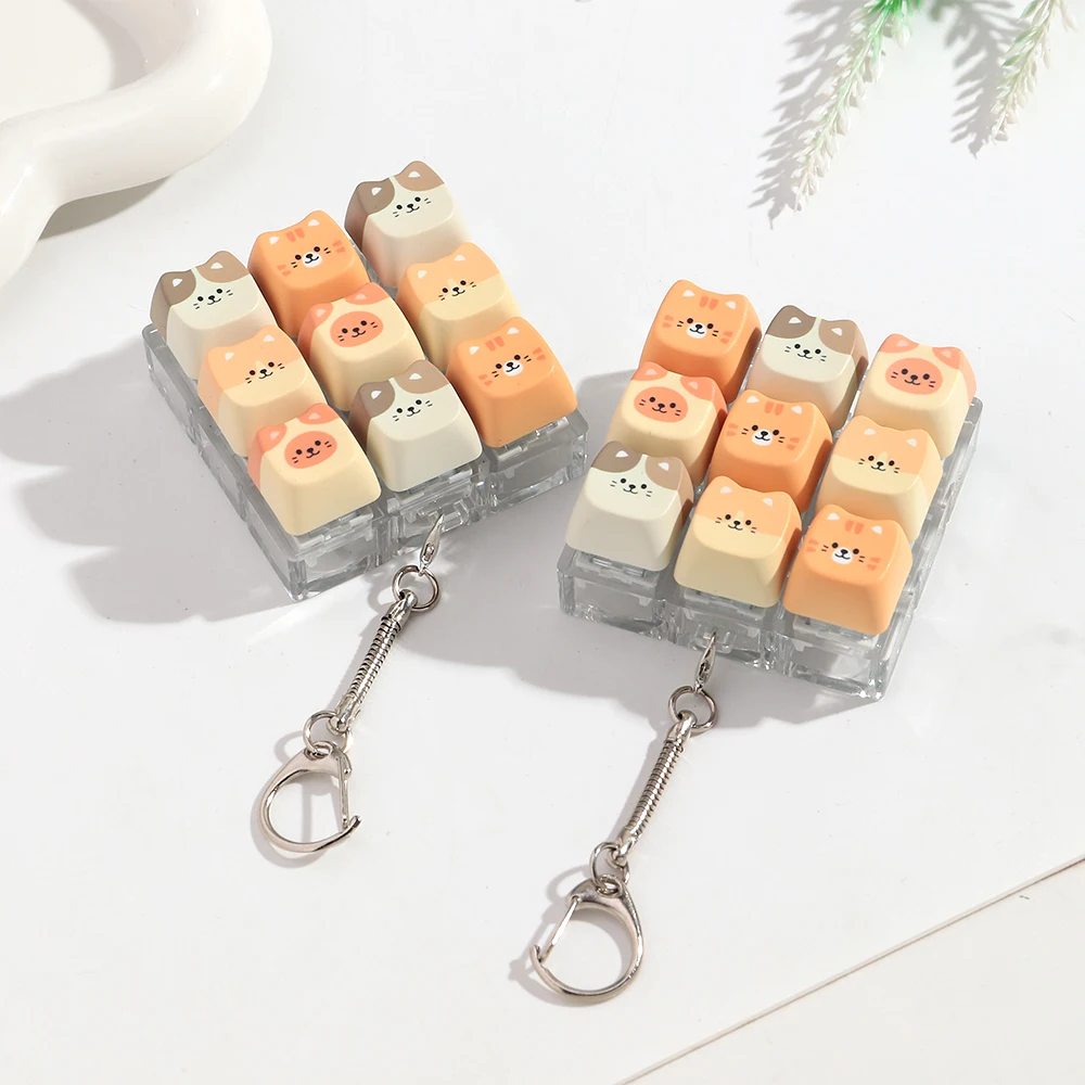 9-Tasten Niedliche Katzen-Tastatur Schlüsselanhänger Ohne Licht Tasten-Spielzeug für Erwachsene Antistress-Spielzeug Anti-Stress Finger-Tastatur-Spiele ﻿