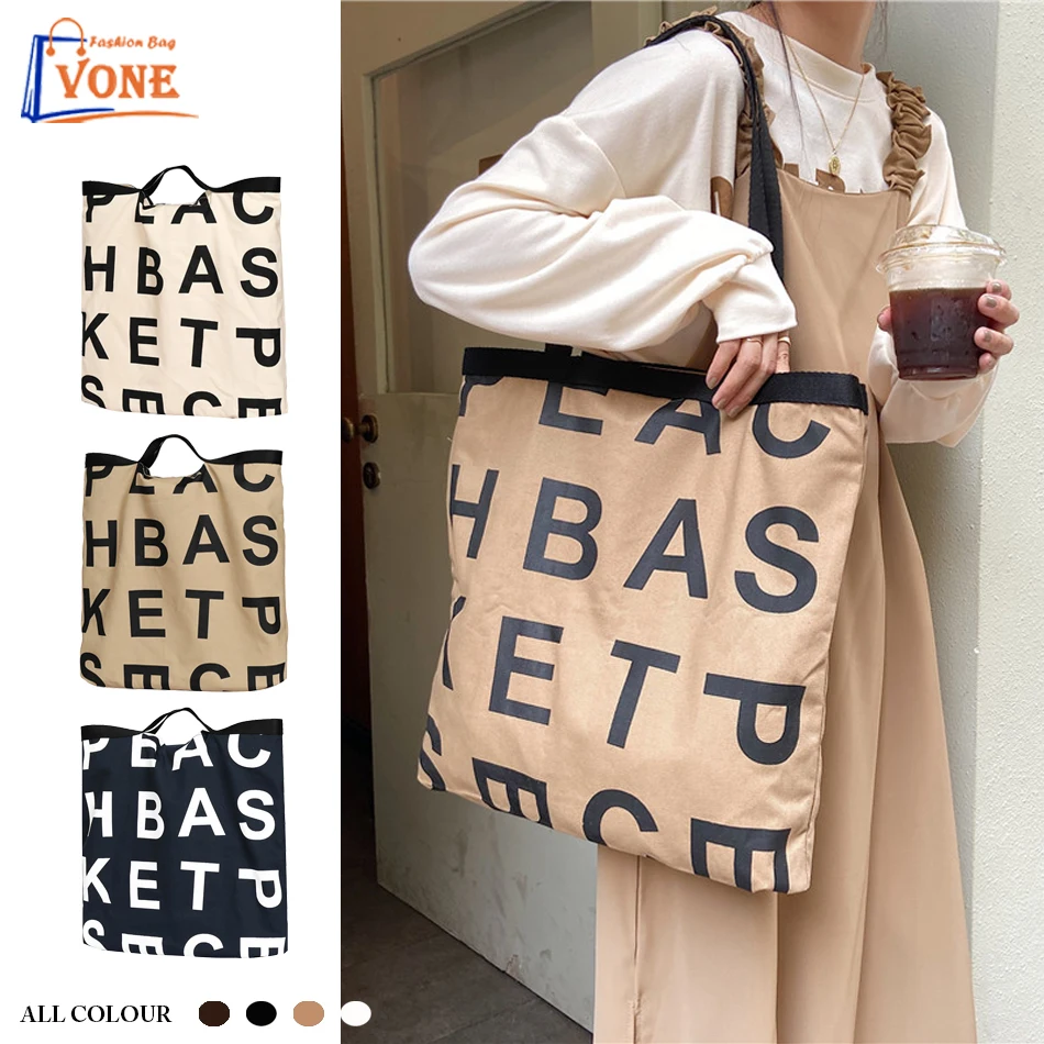 

Korean fashion ins alphabet canvas bag casual versatile hand single shoulder bag women large capacity environmental shopping bag