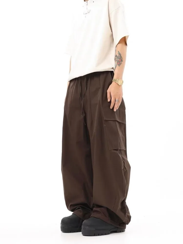 Pantalones Cargo sueltos de Hip-hop para hombre, ropa de calle de moda con cordón, pierna ancha, pantalones casuales de paracaidista arrastrados, Retro, High Street, nuevo