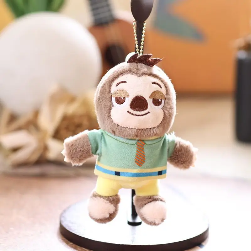 Porte-clés poupée en peluche Judy Nick Zootopia 15cm, petit sac à dos léopard shérif, pendentif de sac, tentures, cadeaux de noël et d'anniversaire pour enfants