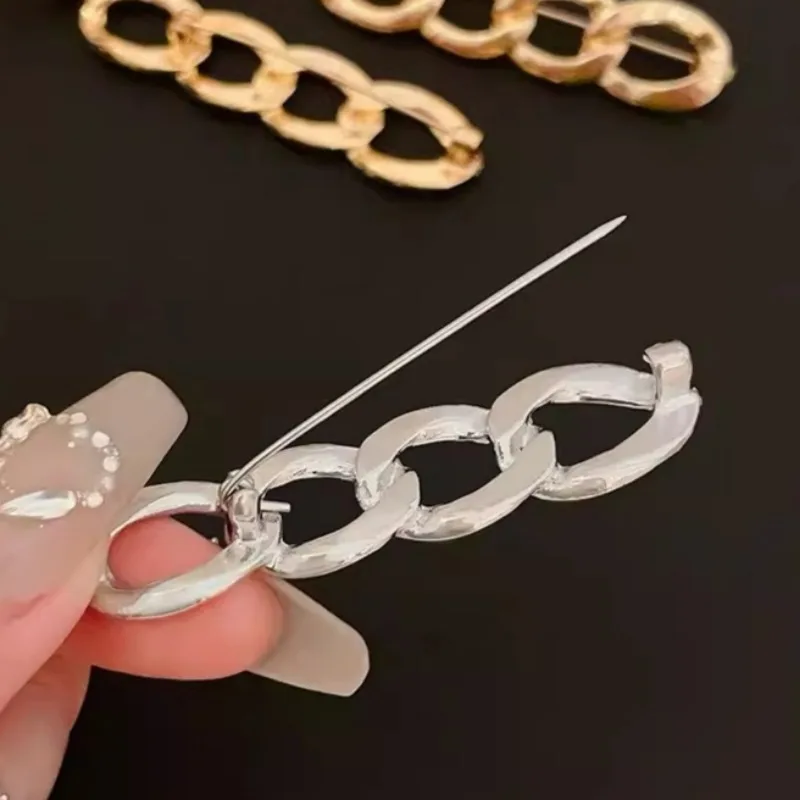 Hebilla de cintura Simple para apretar pantalones, cierre de aleación, ropa, dispositivo de ajuste de cintura retráctil, botón de cintura