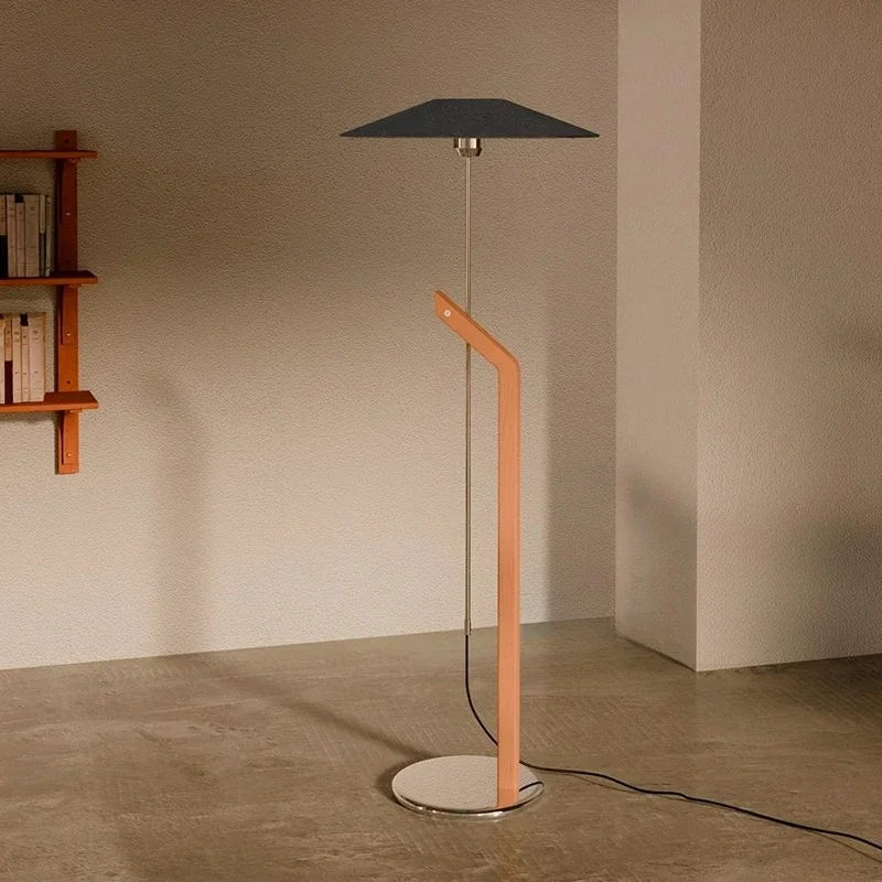 Suspended umbrella floor lamp next to the sofa in the medieval living room, vertical floor lamp