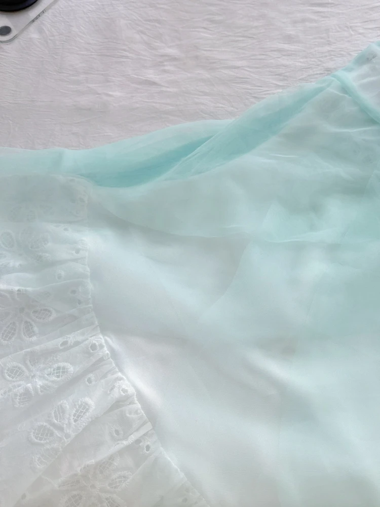 2025 Estate Coreana Moda Vacanza al mare Set da 2 pezzi Donna Fiocco Grembiule trasparente + Elasticità Abito sottoveste Casual Chic Abiti in pizzo