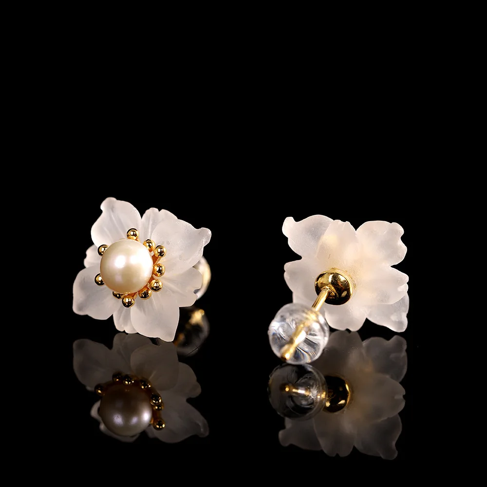 

Ladies white crystal pearl earrings with flowers