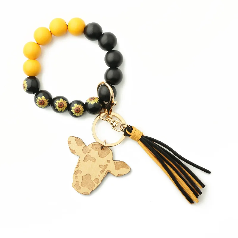 

DHL50pcs Ornaments Tassel Pendant Western Cowboy Bracelet Cow Wood Bead Hand String key chain
