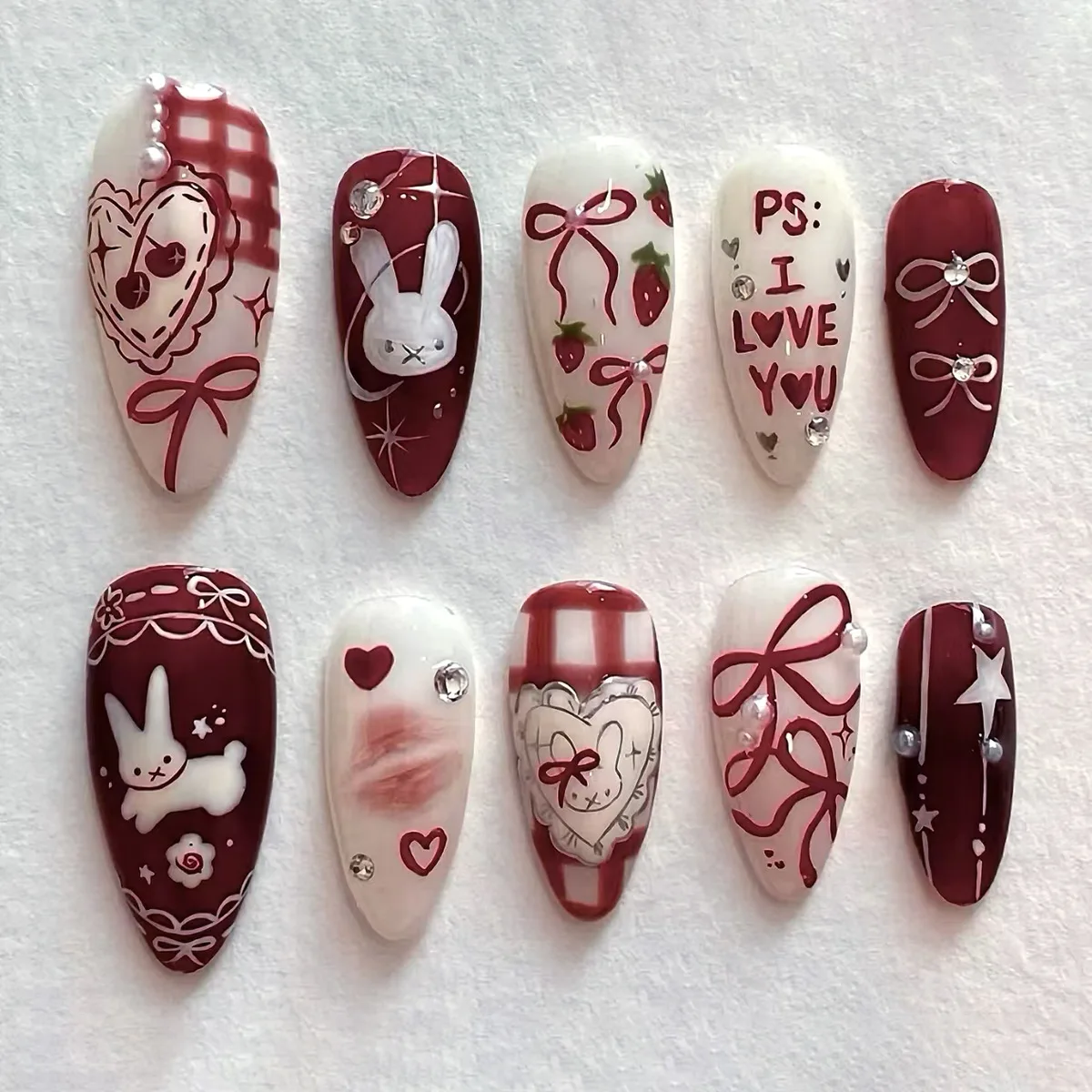 24Pcs Long Almond Press on Nails - White Bunnies with Red Bows, Heart Rhinestones, Pearls and Pink & White Checkered Pattern