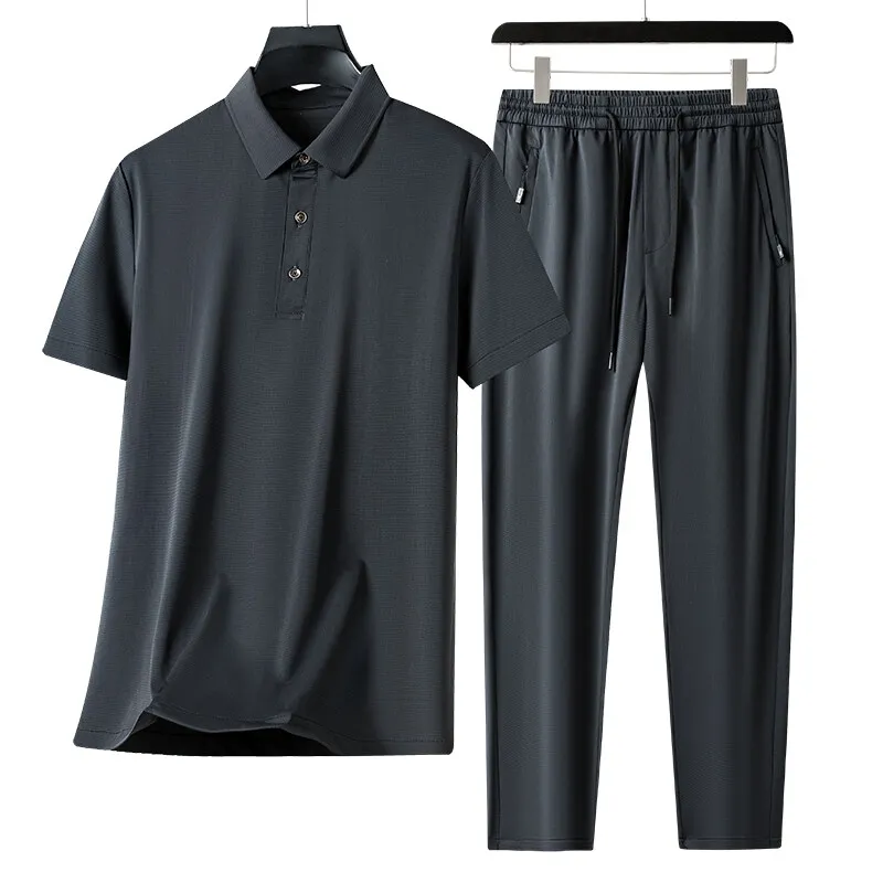 Set di pantaloni a maniche corte traspiranti in seta di ghiaccio tinta unita nuova moda estiva per set da due pezzi sportivo allentato casual da uomo