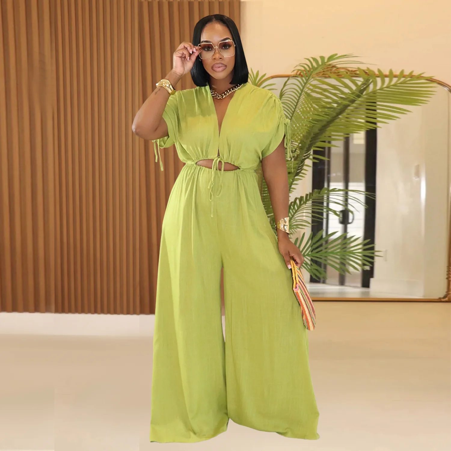 Traje de moda europea y americana personalizado para mujer, mono informal de color sólido con cuello en V y cordones de pierna ancha, nuevo estilo