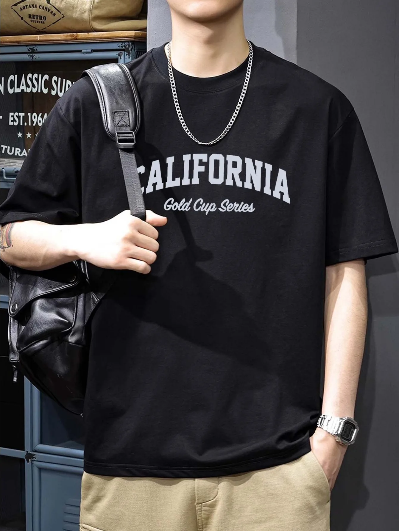 تي شيرت رجالي كاجوال فضفاض من القطن الخالص بنسبة 100% بنمط حروف كاليفورنيا مطبوع مريح برقبة دائرية وأكمام قصيرة