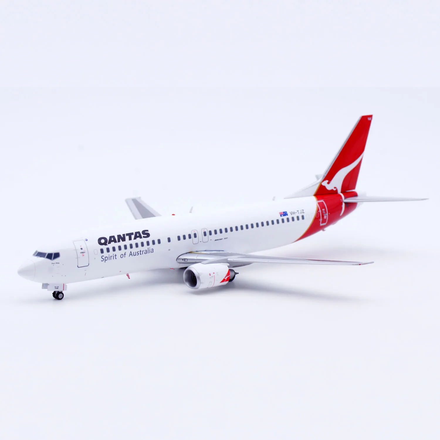 XX20393 سبيكة تحصيل طائرة هدية JC أجنحة 1:200 Qantas الخطوط الجوية بوينغ B737-400 دييكاست نموذج طائرة VH-TJZ مع حامل
