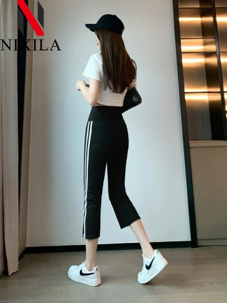 Pantalones de 7 puntos de verano para mujer, pantalones finos de tiburón, pantalones de Yoga cómodos muy elásticos, pantalones cortos deportivos de cintura alta abiertos acampanados