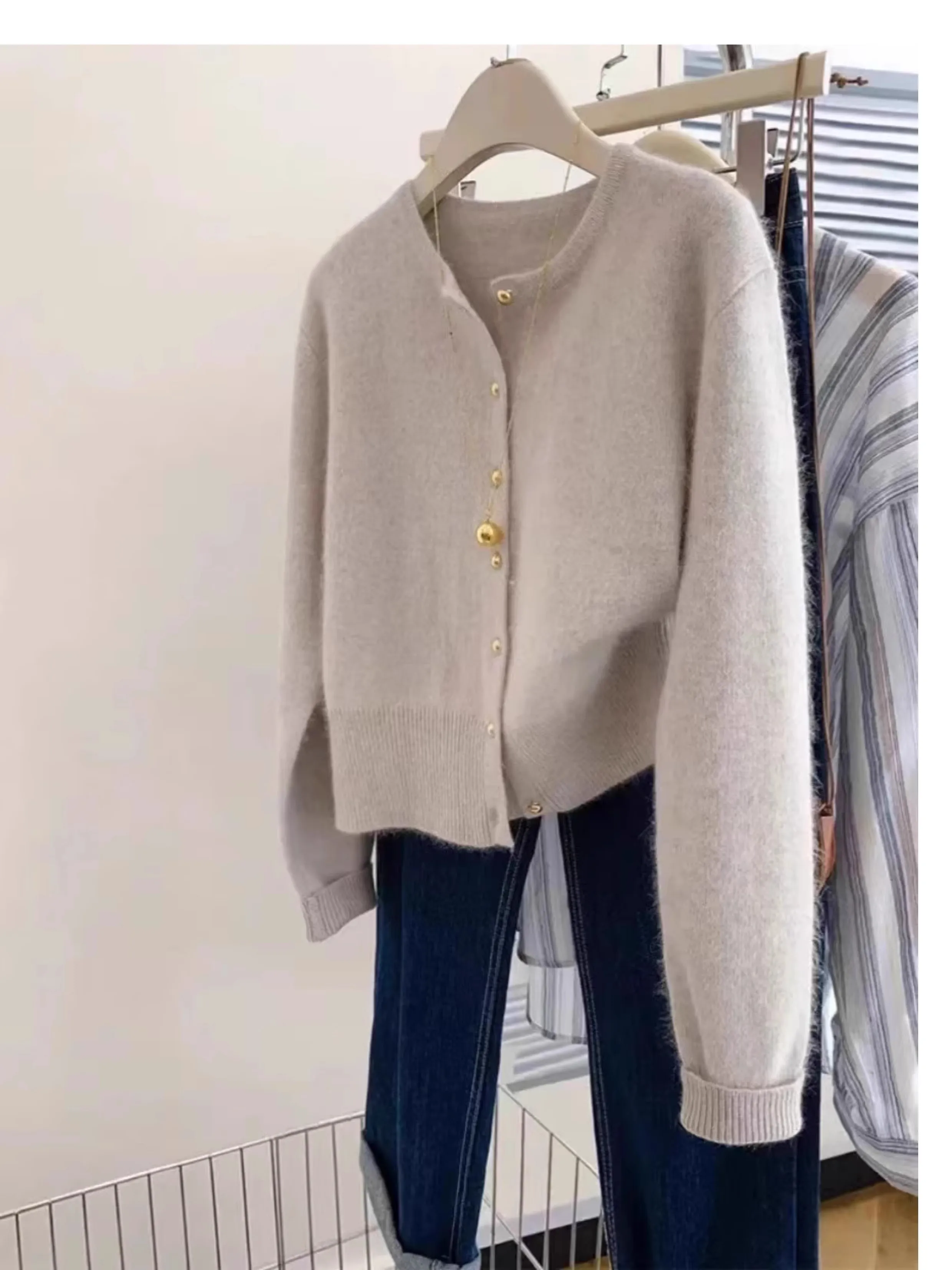 

New hot selling long sleeved knitted women's cardigan O-neck 100% wool sweater autumn and winter short jacket sweater solid colo