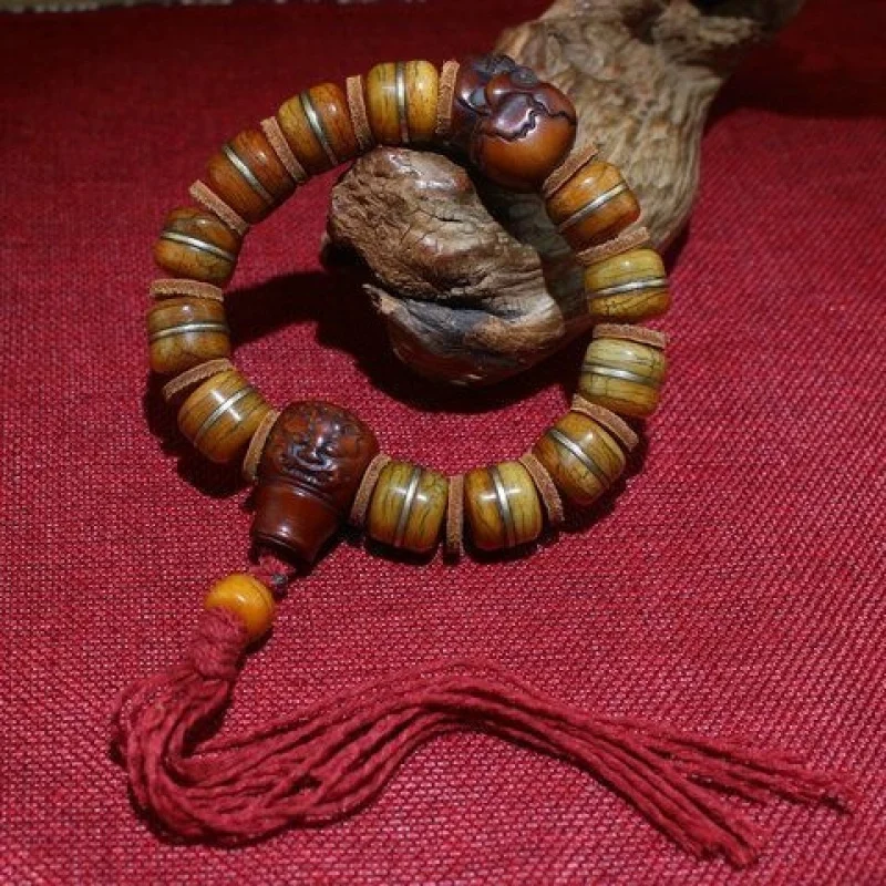 

Подлинный тибетский браслет из кости яка с медными вставками, 1,6 см, в сочетании с бусинами в виде черепов старинного ягуо.