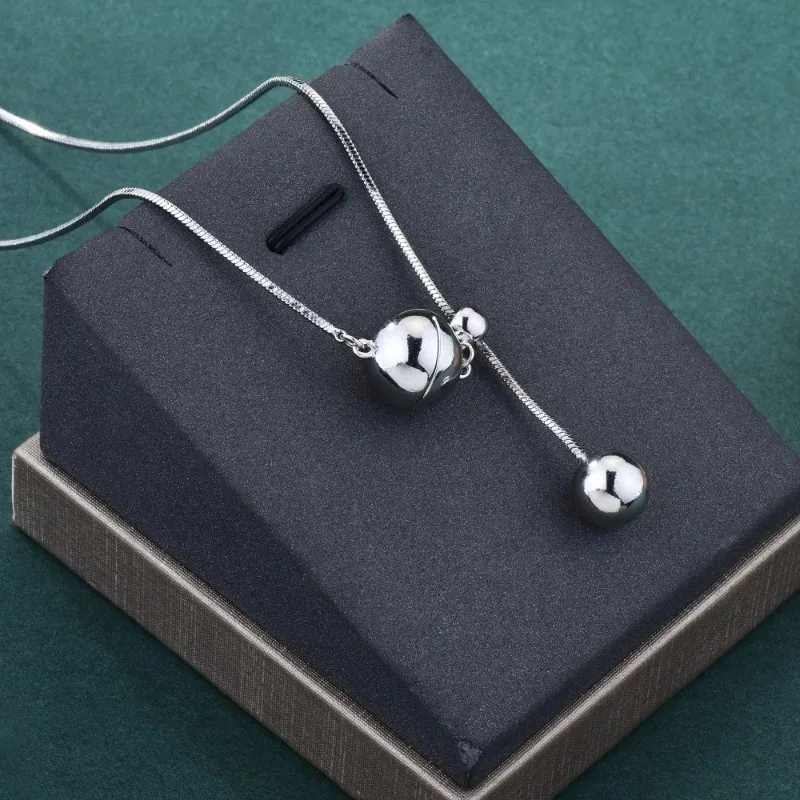 

Simple and high-end sweater chain, magnetic pull geometric long necklace, suitable for women, fashionable clothing necklace