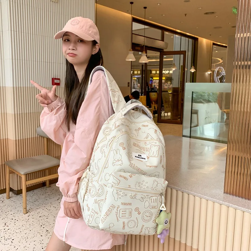 Zaini floreali di moda coreana per le donne zaini in Nylon impermeabili borsa da viaggio per studenti di grande capacità per adolescenti regali