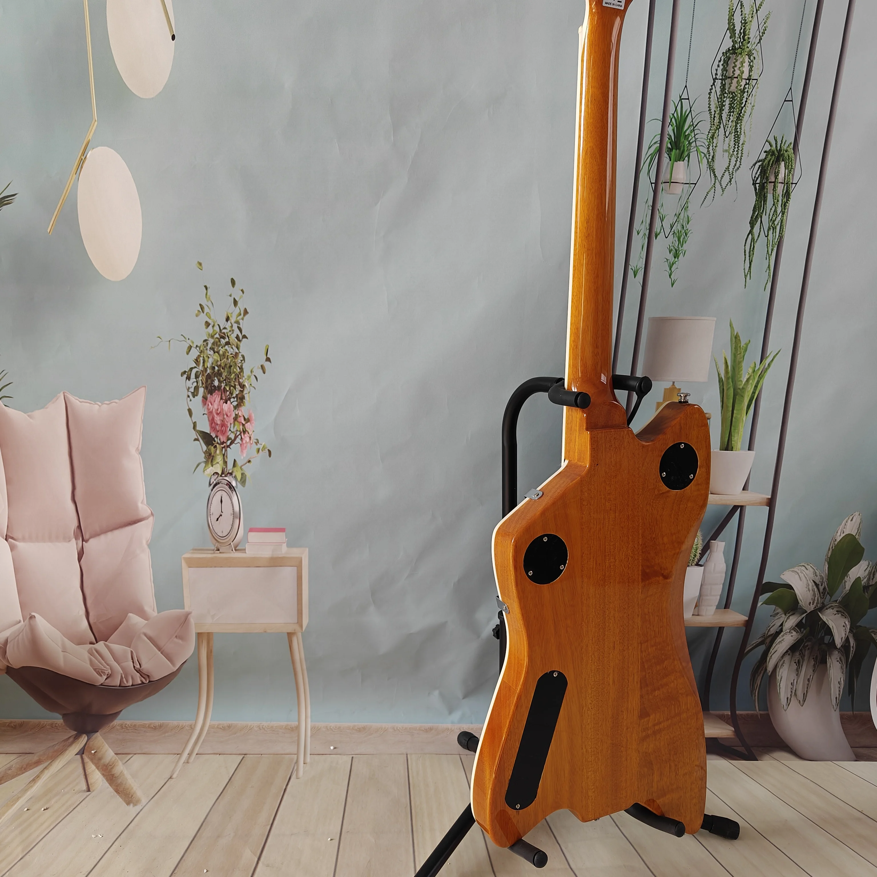 A high-quality acoustic-electric guitar, solid wood body, stainless steel frets, rosewood fretboard, right-handed, 22 frets and