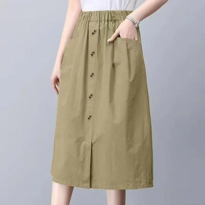 Taille haute 2025 tempérament nouvelle mode décontracté élastique mi-longue mince polyvalent poche jupe