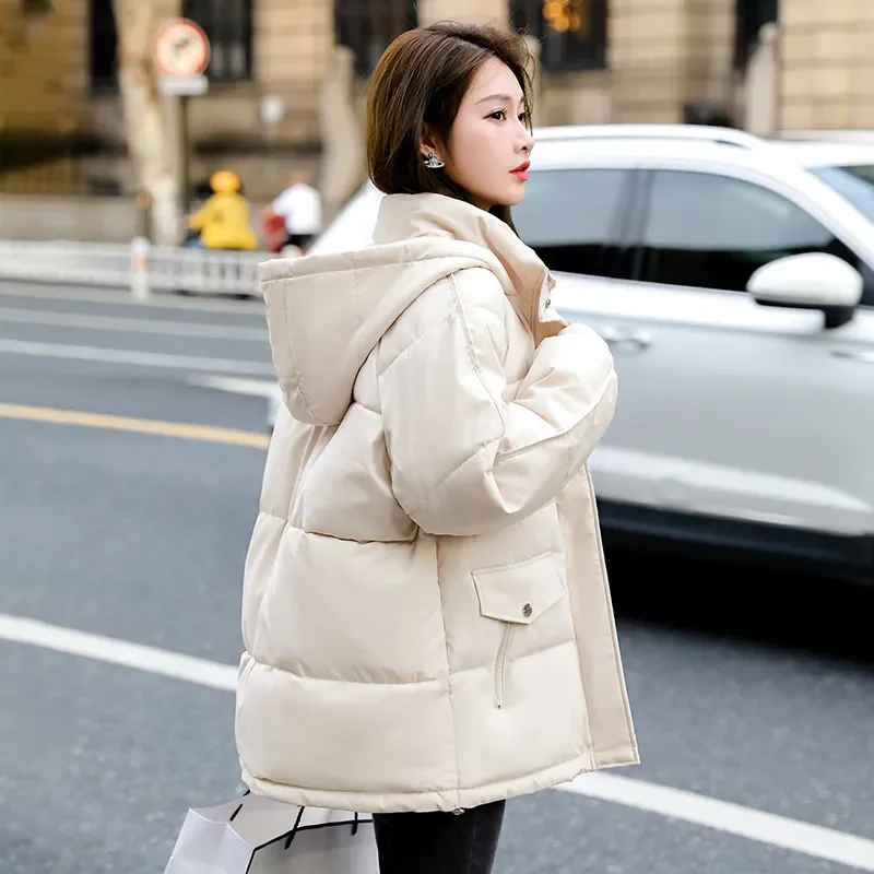 Frauen Daunen Baumwoll kleidung warme kurze Winter y2k Stil koreanische Mode Freizeit wind dichte gepolsterte schwarze Kapuze Outwear Tops