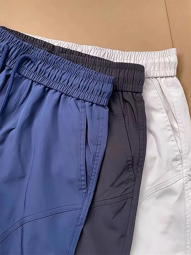

Синие американские Sle Spor orts Мужские летние уличные брюки из ледяного шелка Qui Dry длиной пять четвертей для бега Fitn Four-Quarter Pants