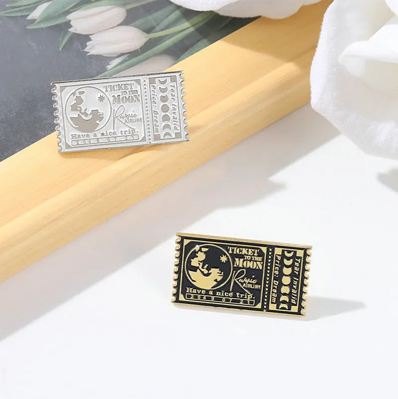 Ticket To The Moon Enamel Pins Custom Black White Trip Stamps Brooches Bag Clothes Lapel Pin Keepsake Jewelry Gift for Women Men