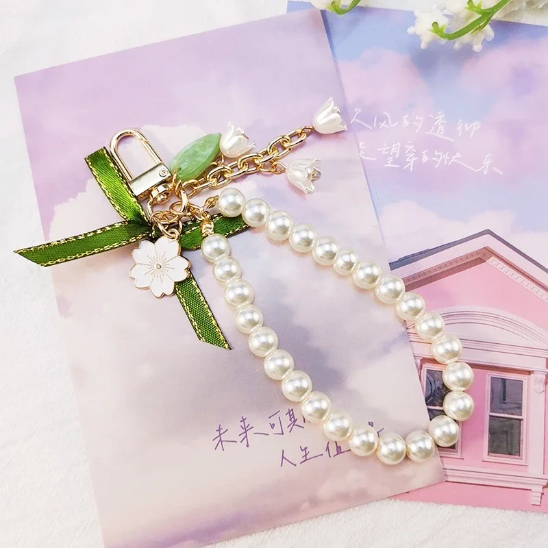 Short Wrist Rope Pearl Strap Green Ribbon Mori Lily Pendant Lily The Orchid Bow Pendant Keychain with Clip Mobile Phone Lanyard