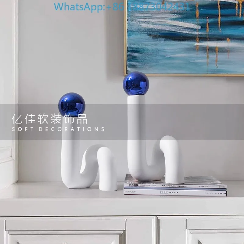 

Modern mi-nimalist and creative curved resin metal ball orn-aments