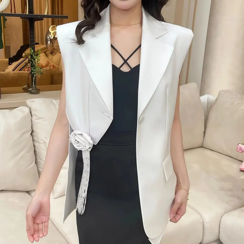 2025 summer new high-end wind thin design sense solid color three-dimensional flower fringed irregular vest jacket women