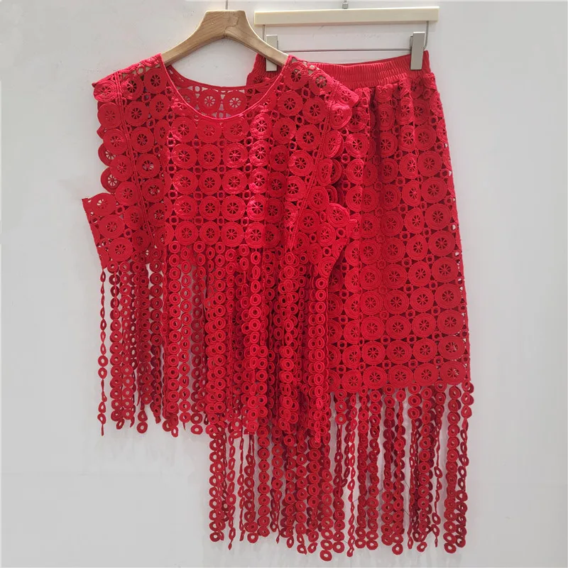 

Clothland Women Sweet Hollow Out Tassel Suit Sleeveless Shirt Midi Skirts Female Chic Two Piece Set TA747